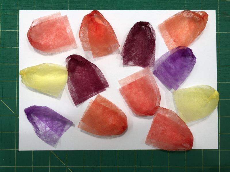 A brightly coloured selection of 12 petals ready to be made into tulips.